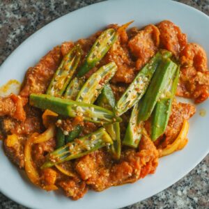A vibrant dish featuring cooked okra